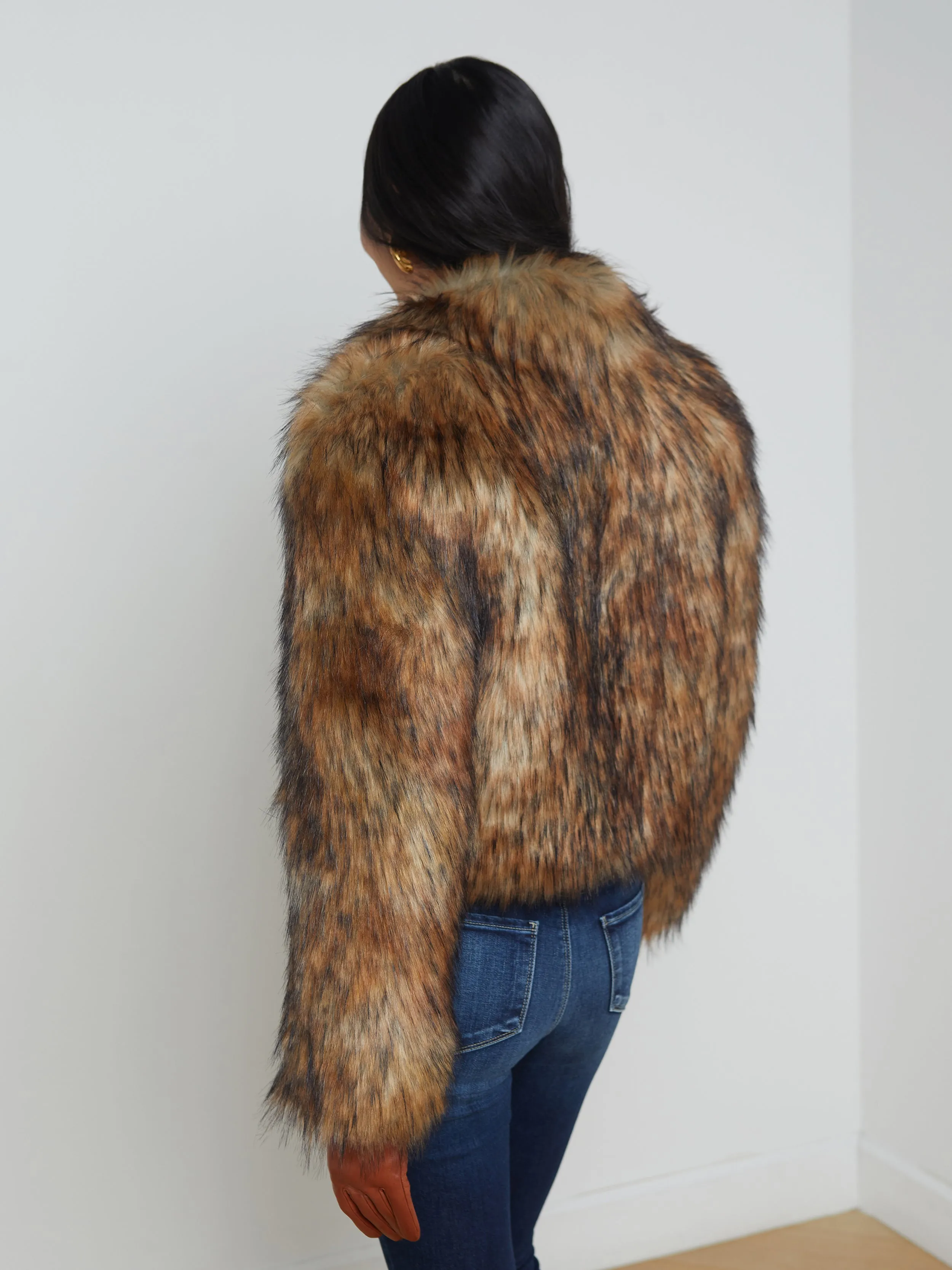 Sure! Here’s an optimized title for the product:

Luxurious Aura Faux Fur Coat for Women - Stylish Longline Jacket with Plush Comfort and Elegant Design

Feel free to adjust any specifics based on your target audience or brand style!