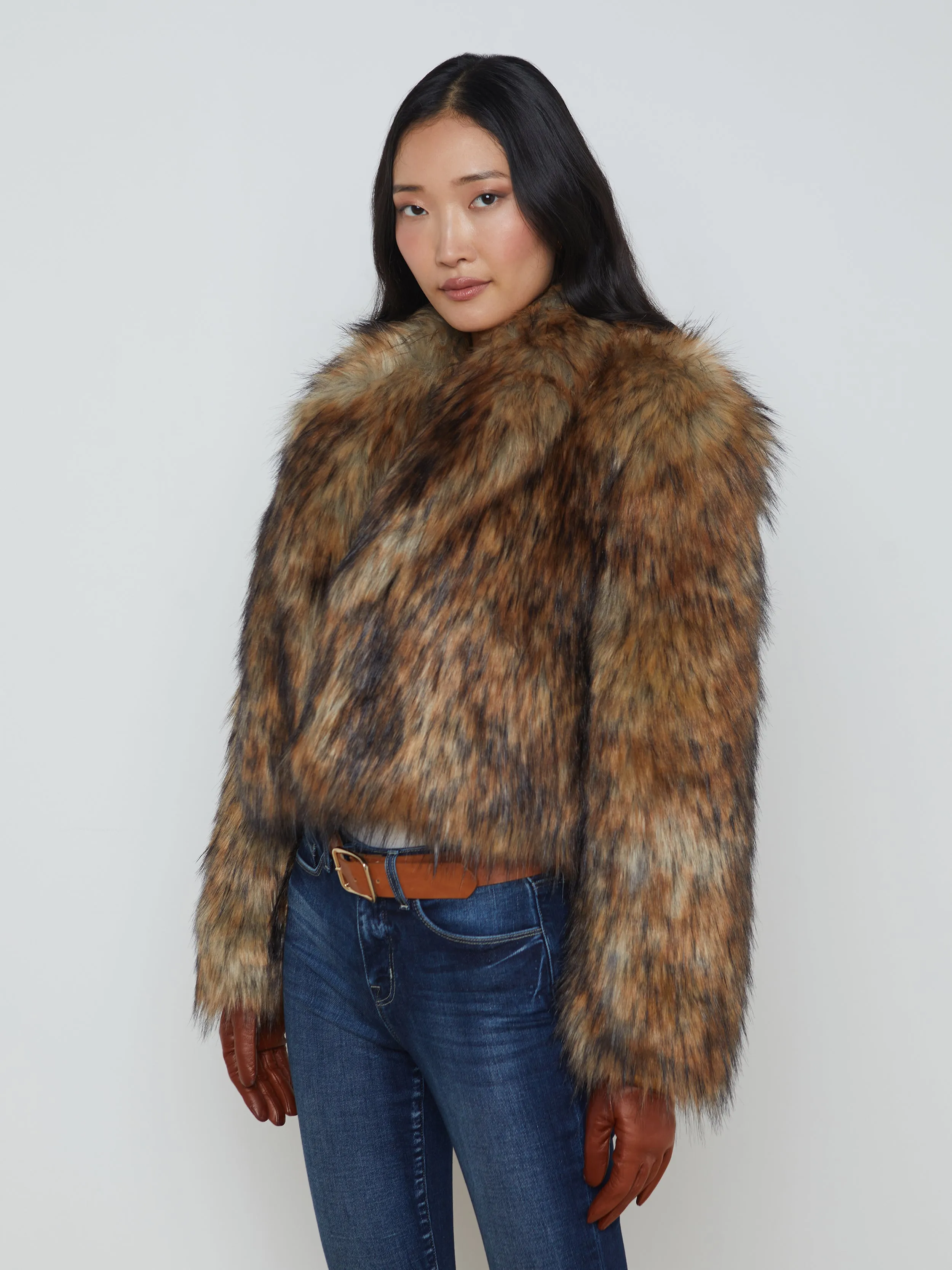 Sure! Here’s an optimized title for the product:

Luxurious Aura Faux Fur Coat for Women - Stylish Longline Jacket with Plush Comfort and Elegant Design

Feel free to adjust any specifics based on your target audience or brand style!