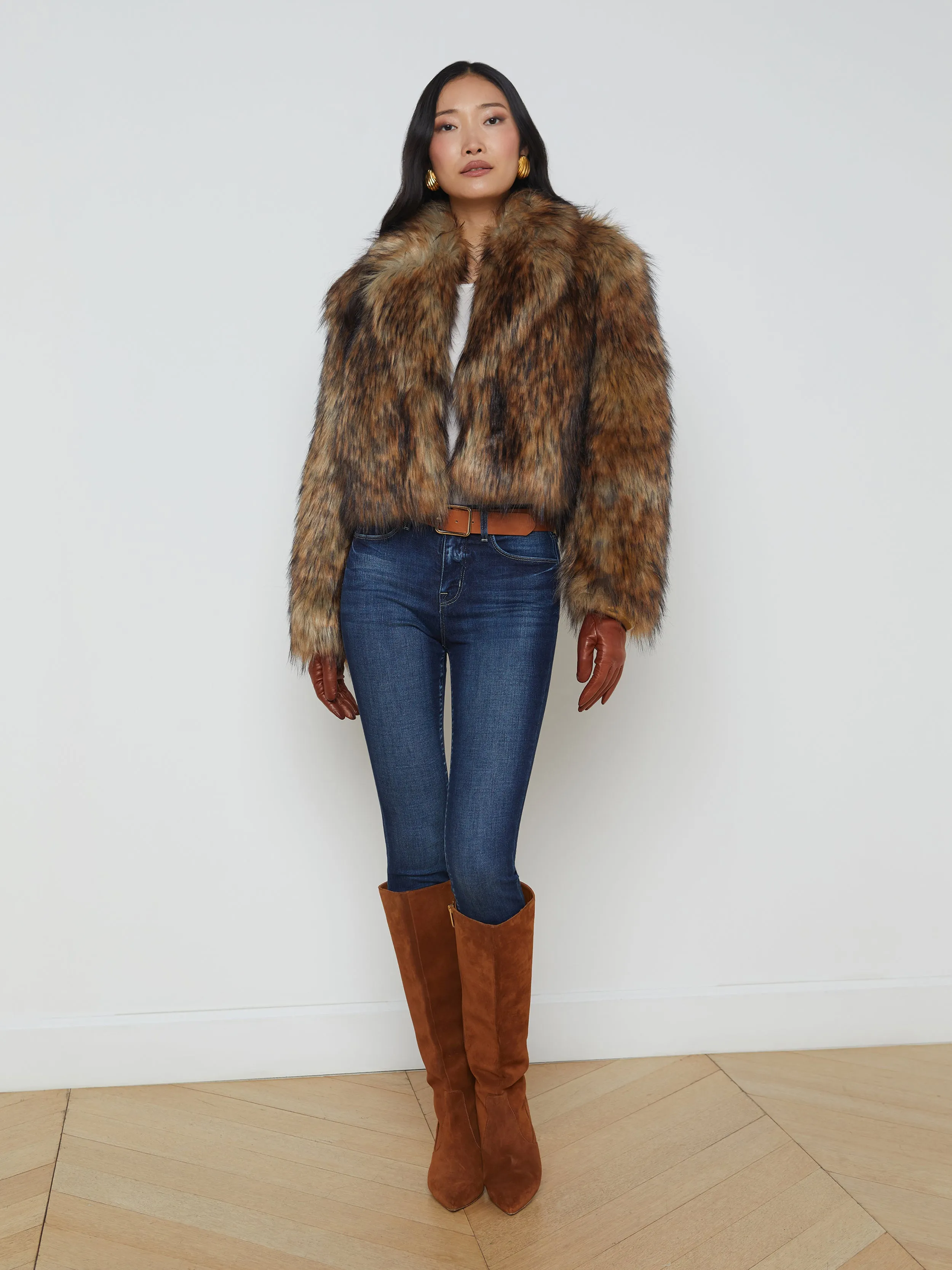 Sure! Here’s an optimized title for the product:

Luxurious Aura Faux Fur Coat for Women - Stylish Longline Jacket with Plush Comfort and Elegant Design

Feel free to adjust any specifics based on your target audience or brand style!