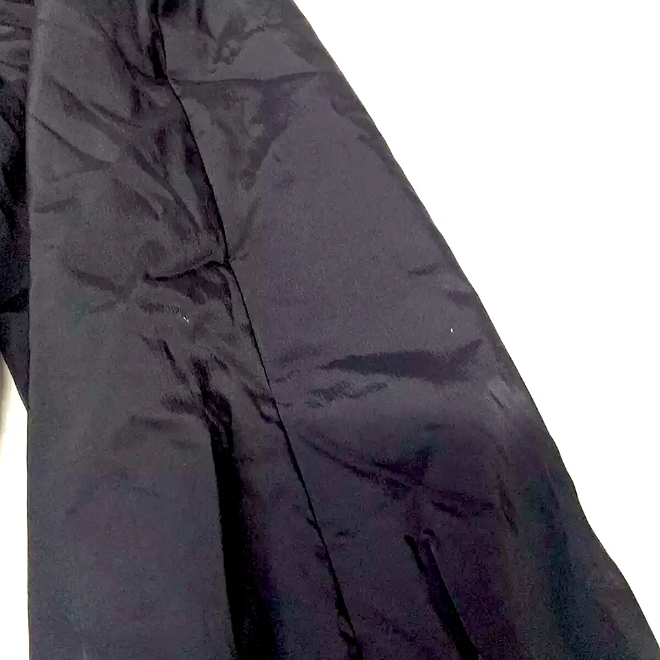 ISSEY MIYAKE JAPAN. EPOCA. Black Nyon Belted Trench Coat